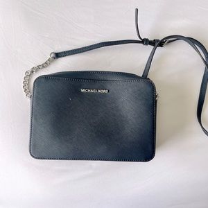 Michael Kors small crossbody in navy with silver hardware.